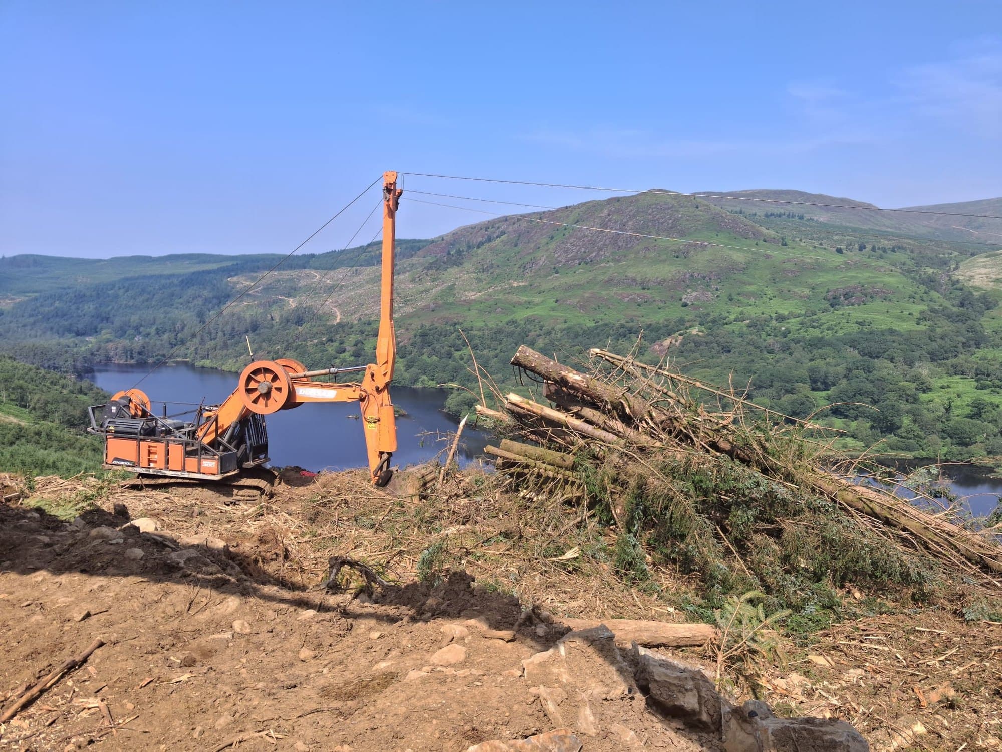 Cable crane yarder rigged on a steep slope above Loch Trool